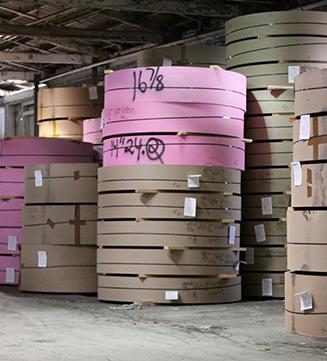 Stacks of large rolls of paper